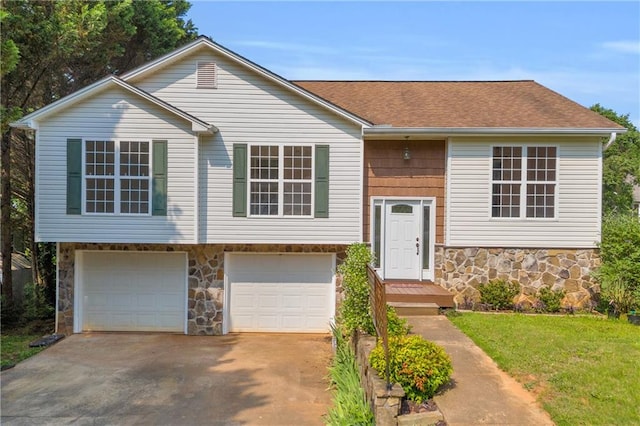 6440 Narramore Way, Lula, GA 30554 - bi-level home with stone siding, an attached garage, driveway, and a shingled roof