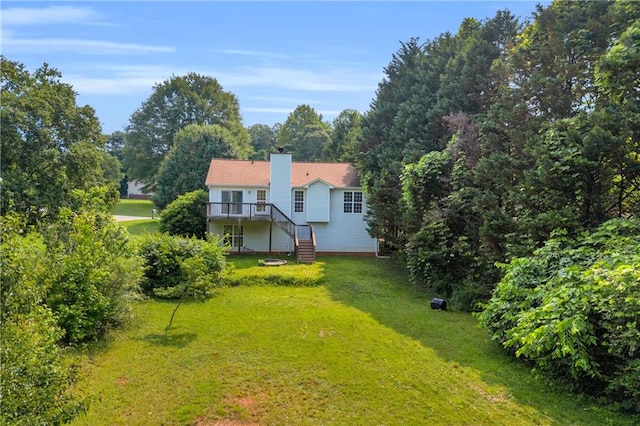6440 Narramore Way, Lula, GA 30554 - view of grassy yard with a wooden deck and stairway