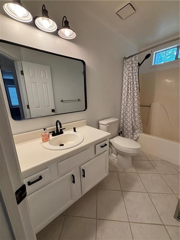 full bath featuring vanity, tile patterned flooring, toilet, and shower / bath combination with curtain
