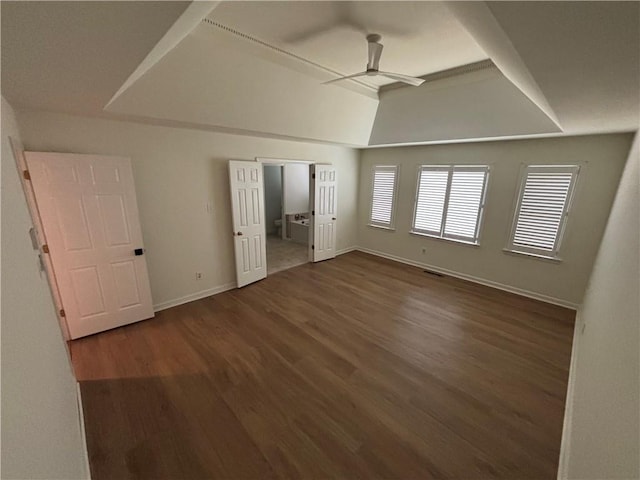 unfurnished bedroom with visible vents, baseboards, ceiling fan, and wood finished floors