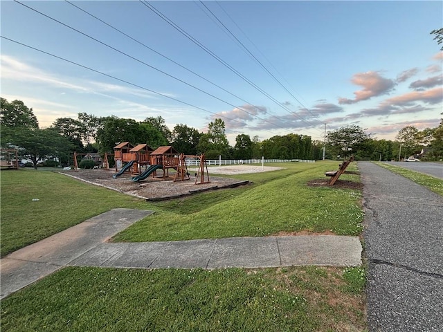 communal playground featuring a yard
