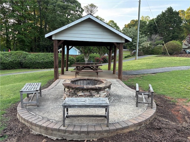 view of patio / terrace featuring a gazebo and an outdoor fire pit