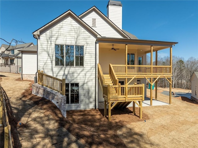 318 Reese Way, Ball Ground, GA 30107 - back of house with ceiling fan, a chimney, a deck, and stairway