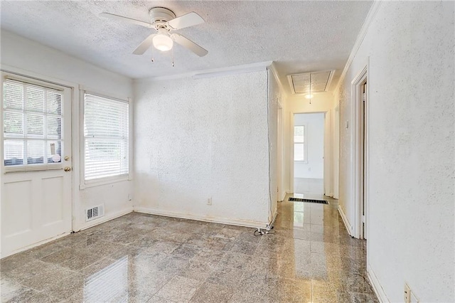 3221 Colquitt Dr, Atlanta, GA 30340 - unfurnished room featuring a textured wall, attic access, granite finish floor, and visible vents