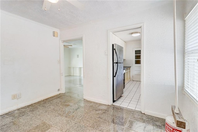 3221 Colquitt Dr, Atlanta, GA 30340 - spare room featuring baseboards, a textured ceiling, and ceiling fan