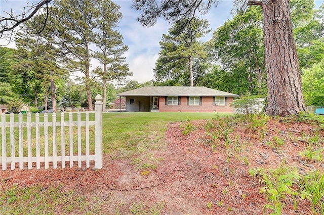 3221 Colquitt Dr, Atlanta, GA 30340 - ranch-style house with fence and a front lawn