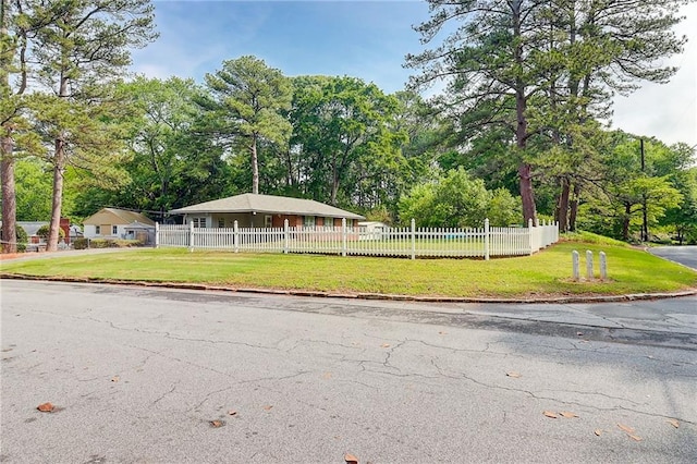 3221 Colquitt Dr, Atlanta, GA 30340 - view of community featuring a lawn and fence private yard
