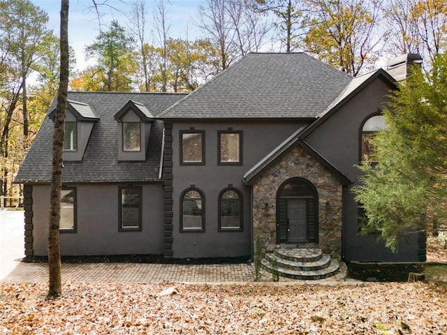 270 Boulder Dr, Roswell, GA 30075 - view of front of home featuring a shingled roof, stucco siding, a chimney, and stone siding