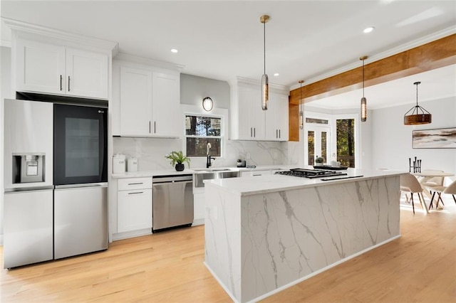 270 Boulder Dr, Roswell, GA 30075 - kitchen featuring stainless steel appliances, light wood finished floors, recessed lighting, decorative backsplash, and white cabinets