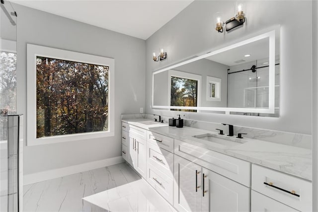 270 Boulder Dr, Roswell, GA 30075 - bathroom featuring marble look tile flooring, double vanity, a shower, and baseboards