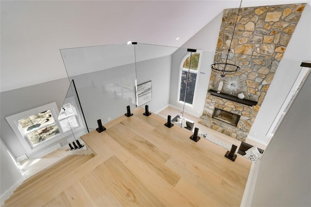 270 Boulder Dr, Roswell, GA 30075 - exercise area with a stone fireplace, baseboards, and high vaulted ceiling