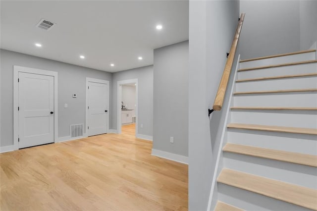 270 Boulder Dr, Roswell, GA 30075 - stairs with recessed lighting, wood finished floors, and baseboards