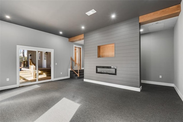 270 Boulder Dr, Roswell, GA 30075 - unfurnished living room with baseboards, stairway, recessed lighting, a fireplace, and dark colored carpet