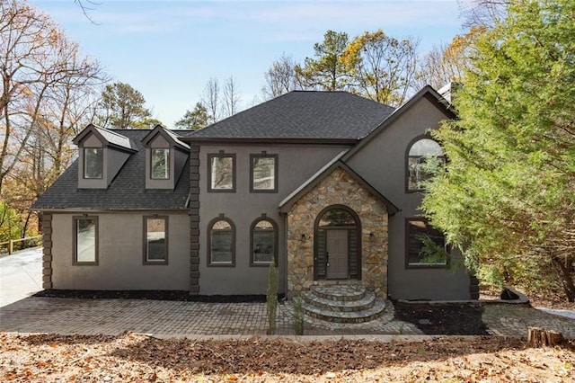270 Boulder Dr, Roswell, GA 30075 - french provincial home featuring stucco siding, roof with shingles, and stone siding