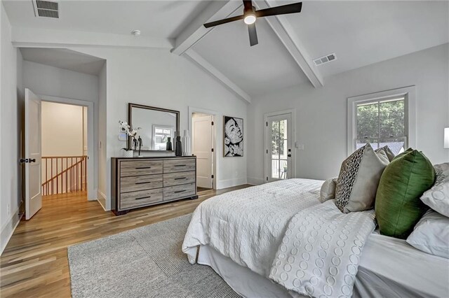 bedroom featuring access to outside, vaulted ceiling with beams, light hardwood / wood-style floors, and ceiling fan