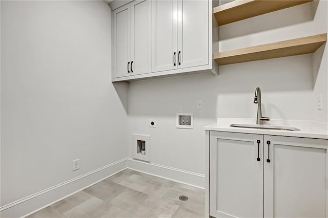 laundry room featuring washer hookup, sink, cabinets, and hookup for an electric dryer