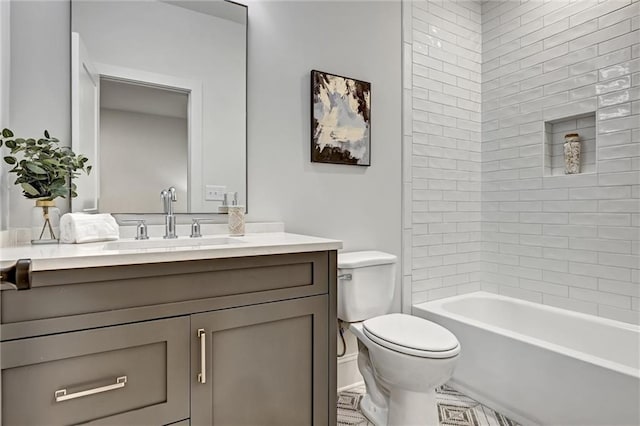 full bathroom with vanity, toilet, and tiled shower / bath combo