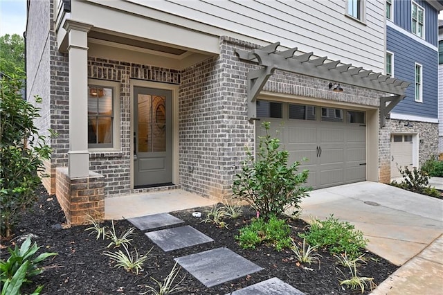 entrance to property featuring a garage