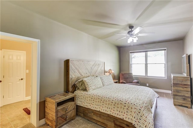 bedroom with light colored carpet and ceiling fan