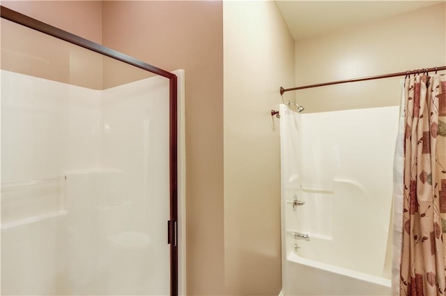 bathroom featuring shower / tub combo with curtain