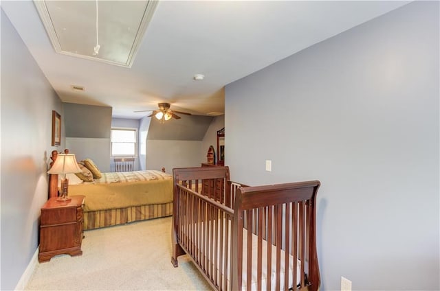 bedroom with light carpet, lofted ceiling, and ceiling fan