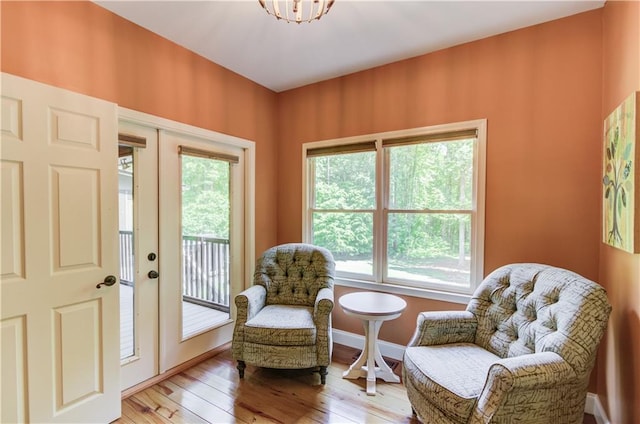 sitting room featuring light hardwood / wood-style flooring