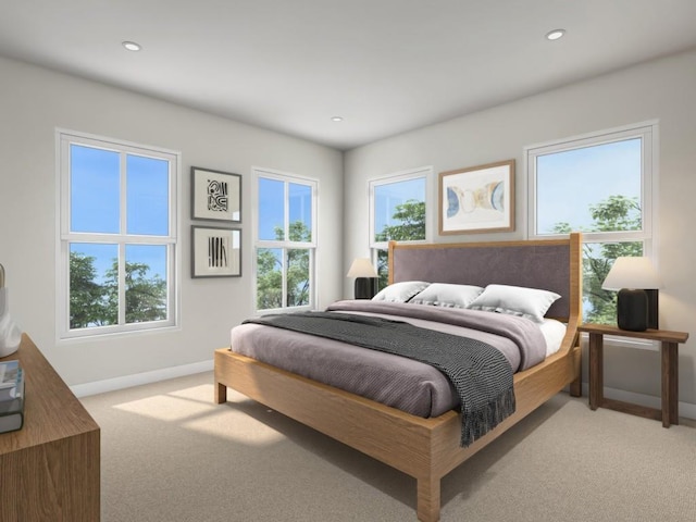 carpeted bedroom with multiple windows