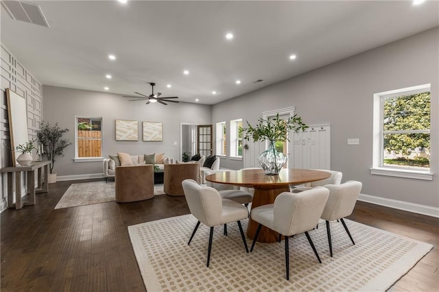 dining room featuring ceiling fan and dark hardwood / wood-style floors