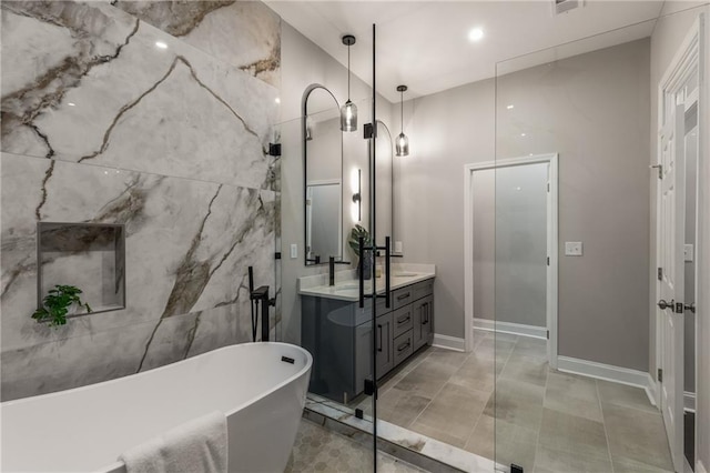 bathroom featuring vanity and a bathing tub