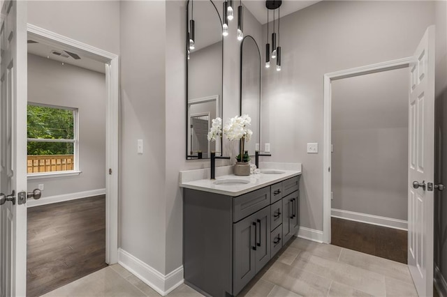 bathroom featuring tile patterned floors and vanity