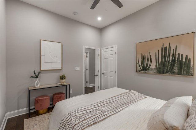 bedroom featuring ceiling fan and dark wood-type flooring