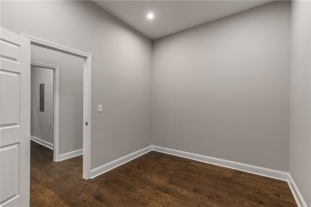 empty room featuring dark hardwood / wood-style floors