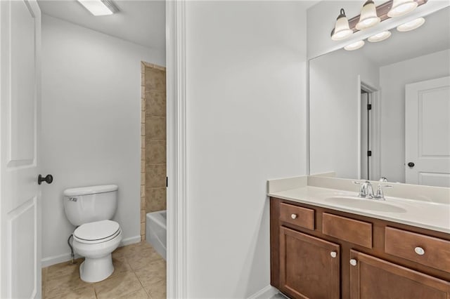 full bathroom with tiled shower / bath, tile patterned floors, toilet, and vanity