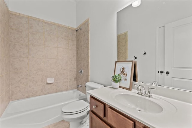 full bathroom with tiled shower / bath combo, vanity, and toilet