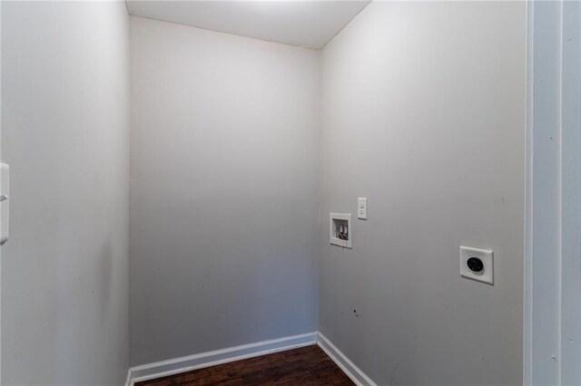 laundry area with hookup for an electric dryer, dark hardwood / wood-style flooring, and hookup for a washing machine