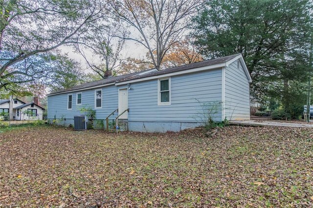 view of front of home featuring central AC unit