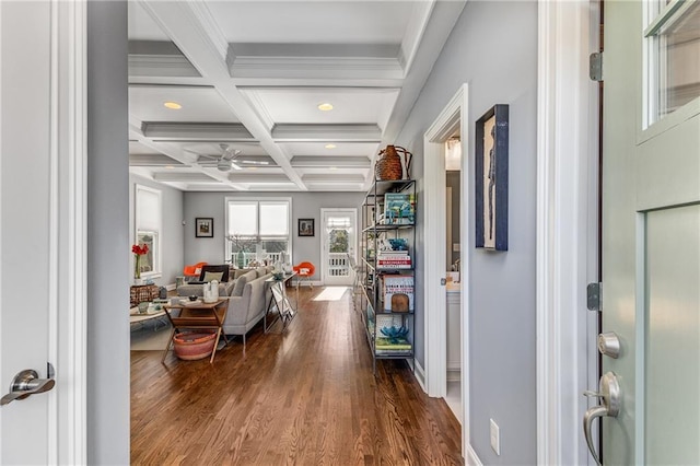 entryway with crown molding, beamed ceiling, wood finished floors, and coffered ceiling