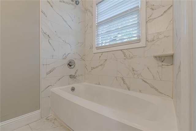 bathroom with baseboards and marble finish floor