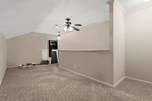 additional living space featuring ceiling fan, lofted ceiling, and light carpet