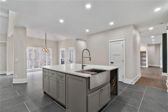 1066 Fairway Valley Dr, Woodstock, GA 30189 - kitchen featuring a sink, gray cabinets, dark tile patterned flooring, baseboards, and recessed lighting