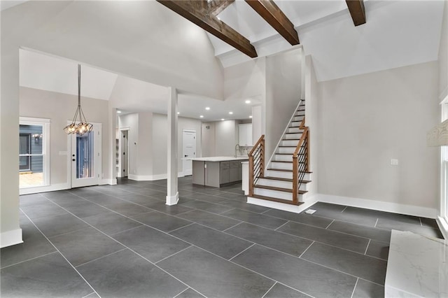 1066 Fairway Valley Dr, Woodstock, GA 30189 - entryway featuring high vaulted ceiling, baseboards, stairs, a chandelier, and beamed ceiling
