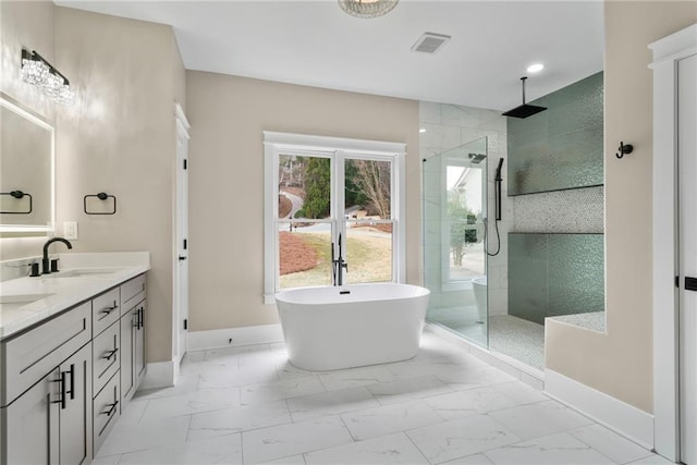 1066 Fairway Valley Dr, Woodstock, GA 30189 - full bath with marble look tile flooring, a stall shower, baseboards, a freestanding bath, and double vanity