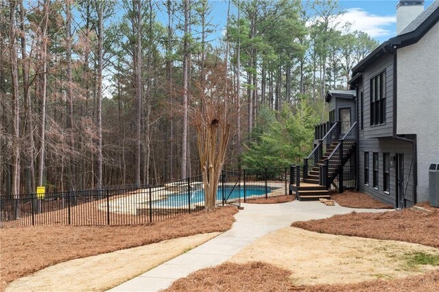 1066 Fairway Valley Dr, Woodstock, GA 30189 - view of yard featuring fence, stairs, and a patio area