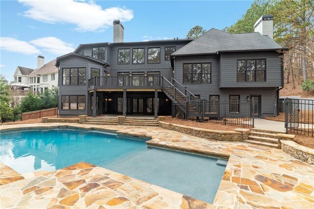 1066 Fairway Valley Dr, Woodstock, GA 30189 - view of pool featuring stairs, a wooden deck, and a patio