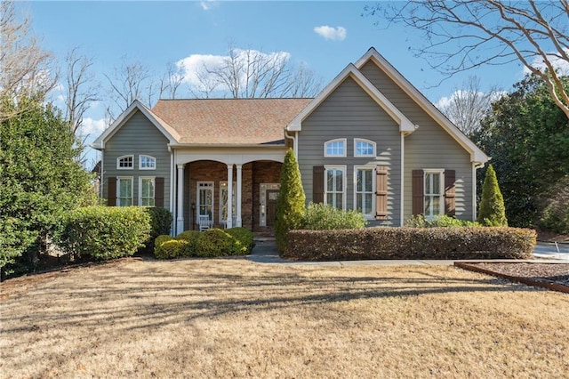 view of front of house with a front lawn