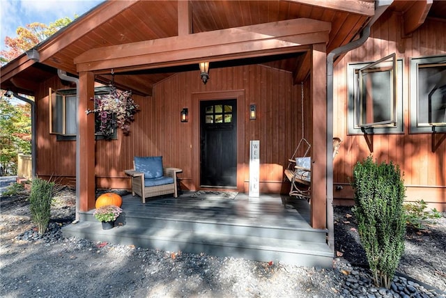 entrance to property featuring a deck