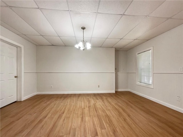 6001 Deer Springs Ln NW, Acworth, GA 30101 - spare room with a paneled ceiling, light wood finished floors, and baseboards