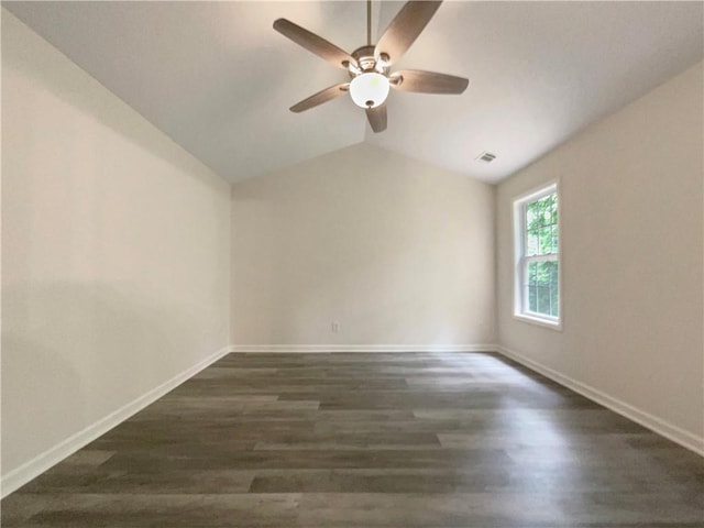 6001 Deer Springs Ln NW, Acworth, GA 30101 - spare room with ceiling fan, dark wood-style flooring, baseboards, and lofted ceiling