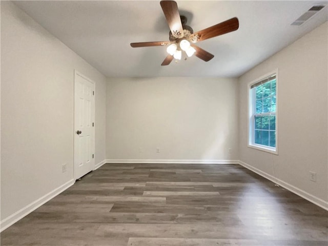 6001 Deer Springs Ln NW, Acworth, GA 30101 - unfurnished room featuring wood finished floors, a ceiling fan, and baseboards