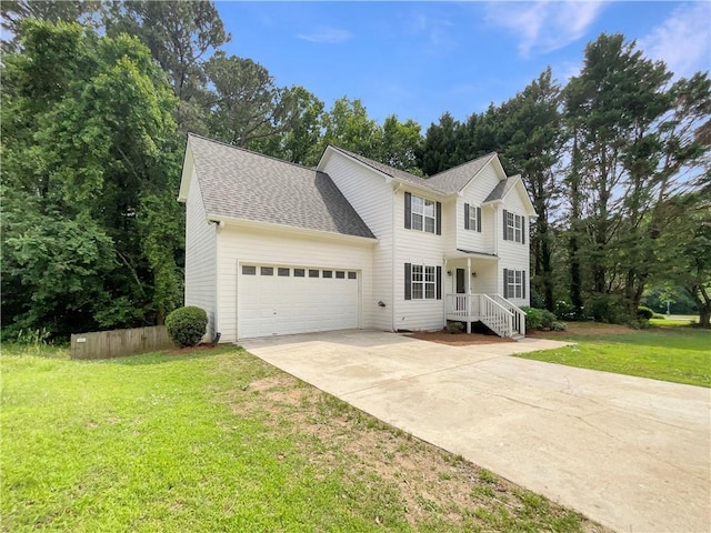 6001 Deer Springs Ln NW, Acworth, GA 30101 - view of front of house with an attached garage, driveway, a front yard, and a shingled roof